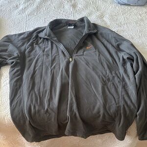 Nike Men's Gray Zip-Up Sweater with Orange Logo